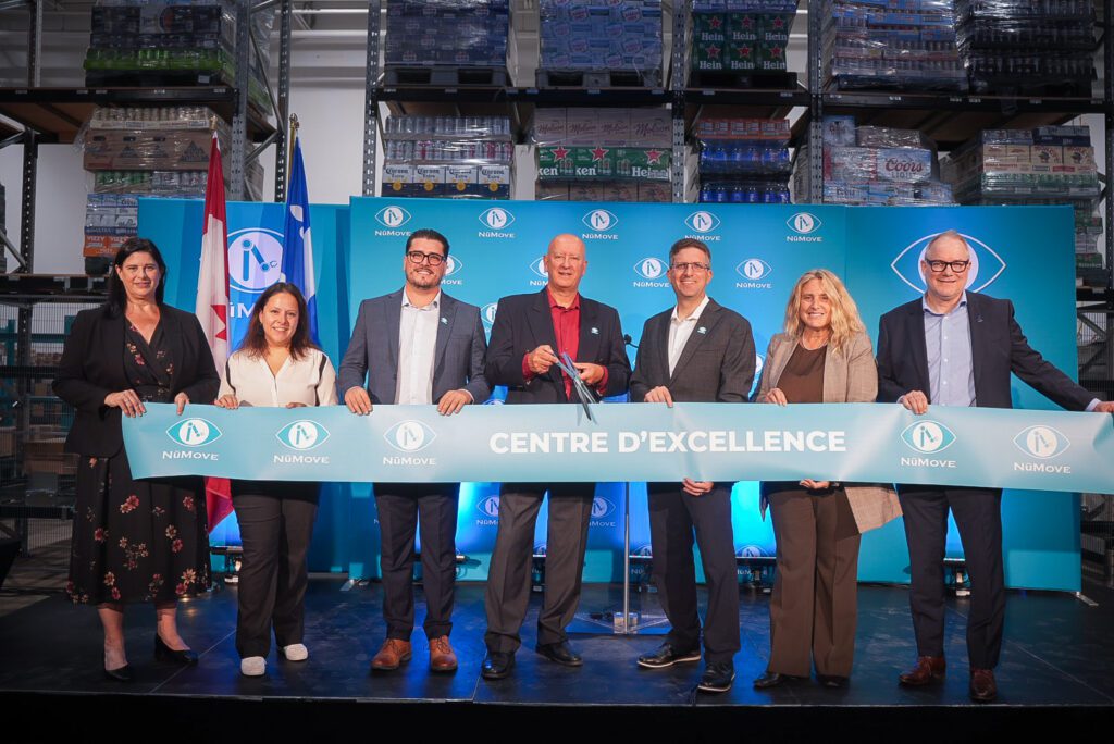 local elected officials and NūMove associates cutting the ribbon during the grand opening ceremony
