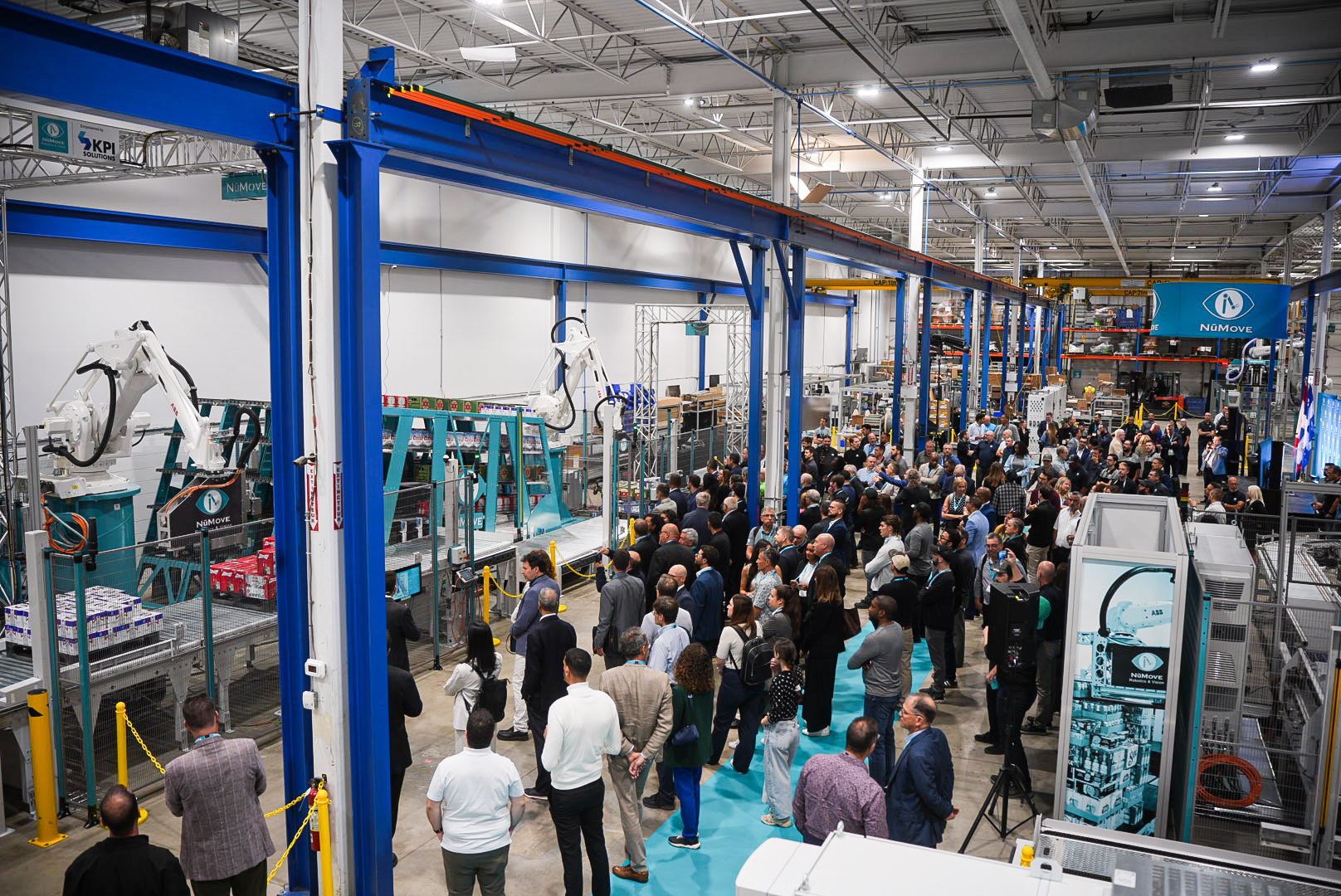 Guests watching the demonstration of solutions during the grand opening